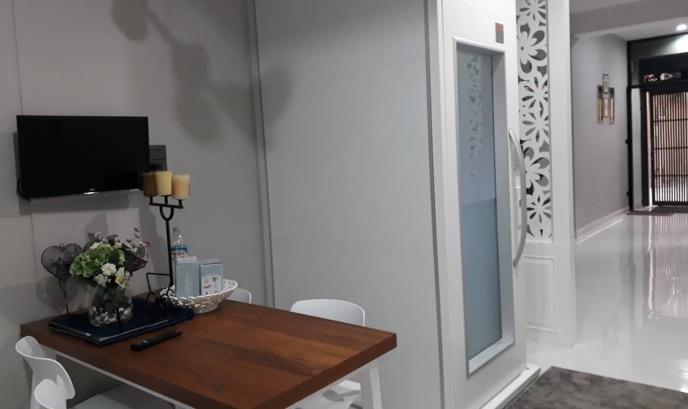 Cibes Lift Installed on a Shared Wall in a Townhouse Cibes Lift Installed on a Shared Wall in a Townhouse