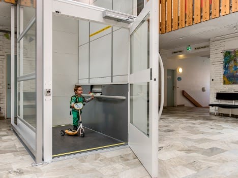 Cibes Lift Extra size A8000 1000kg in a school with a kid on a scooter Cibes Lift Extra size A8000 1000kg in a school with a kid on a scooter